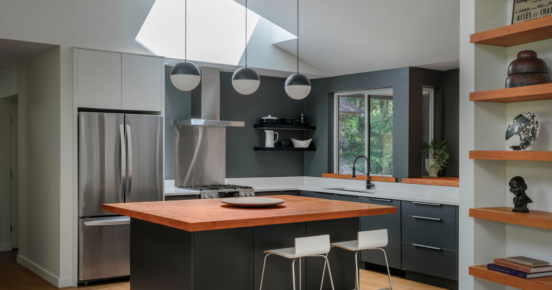 The kitchen island offers both functional space for cooking and an elegant place for casual gatherings
